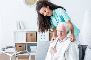 Doctor helping senior man