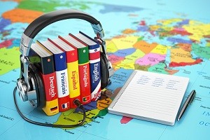 Learning languages online. Audiobooks concept. Books and headpho