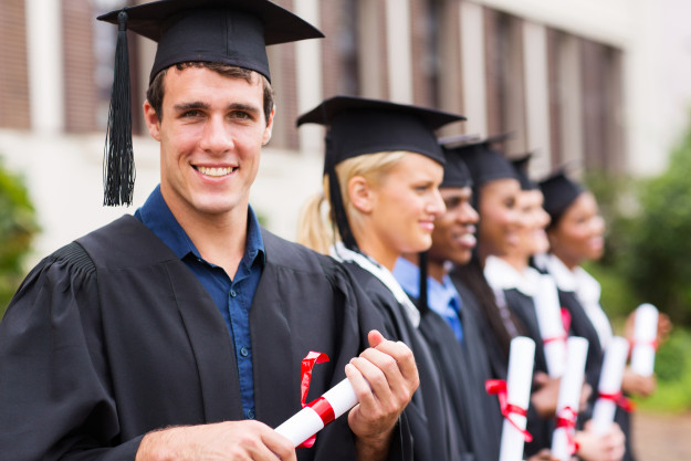 cheerful college graduates student loan borrowers