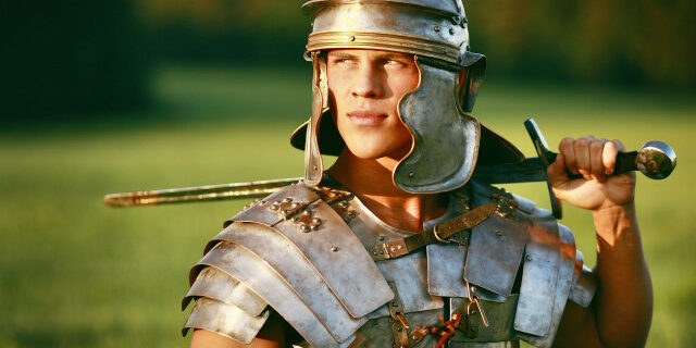 One Brave Roman soldier in field. debt collection agency