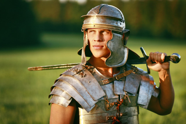 One Brave Roman soldier in field. debt collection agency