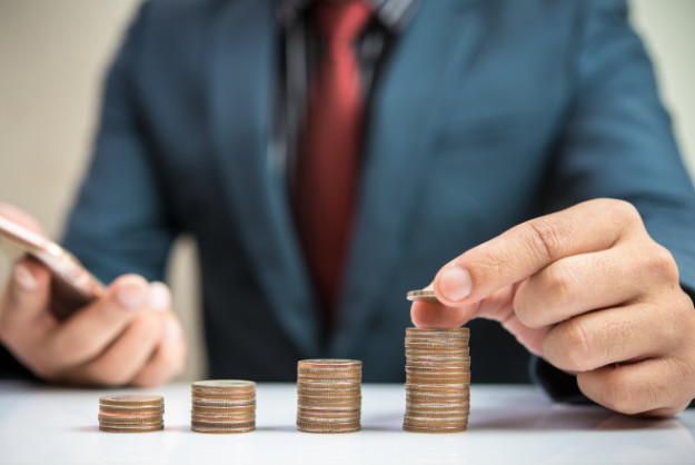 Businessman Hand Put Coin