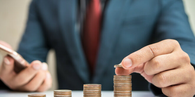 Businessman Hand Put Coin
