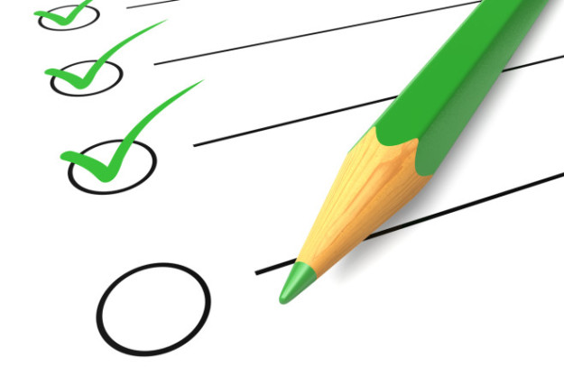 Checklist green pencil hiring a debt collection agency