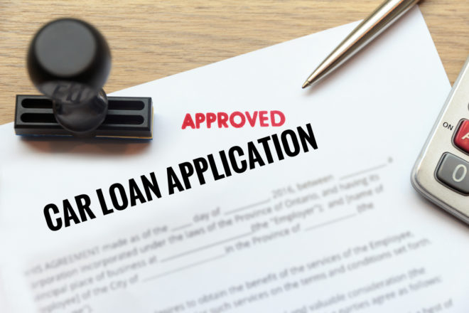 Approved car loan application form lay down on desk seriously delinquent