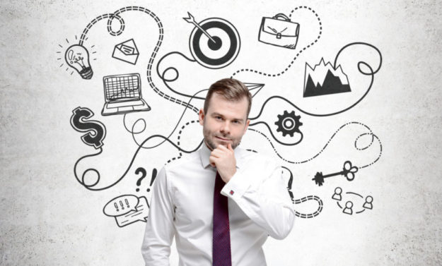 Pensive bearded man and a business plan tax season strategies