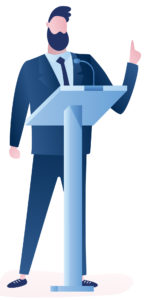 Man standing and speaking in front of podium